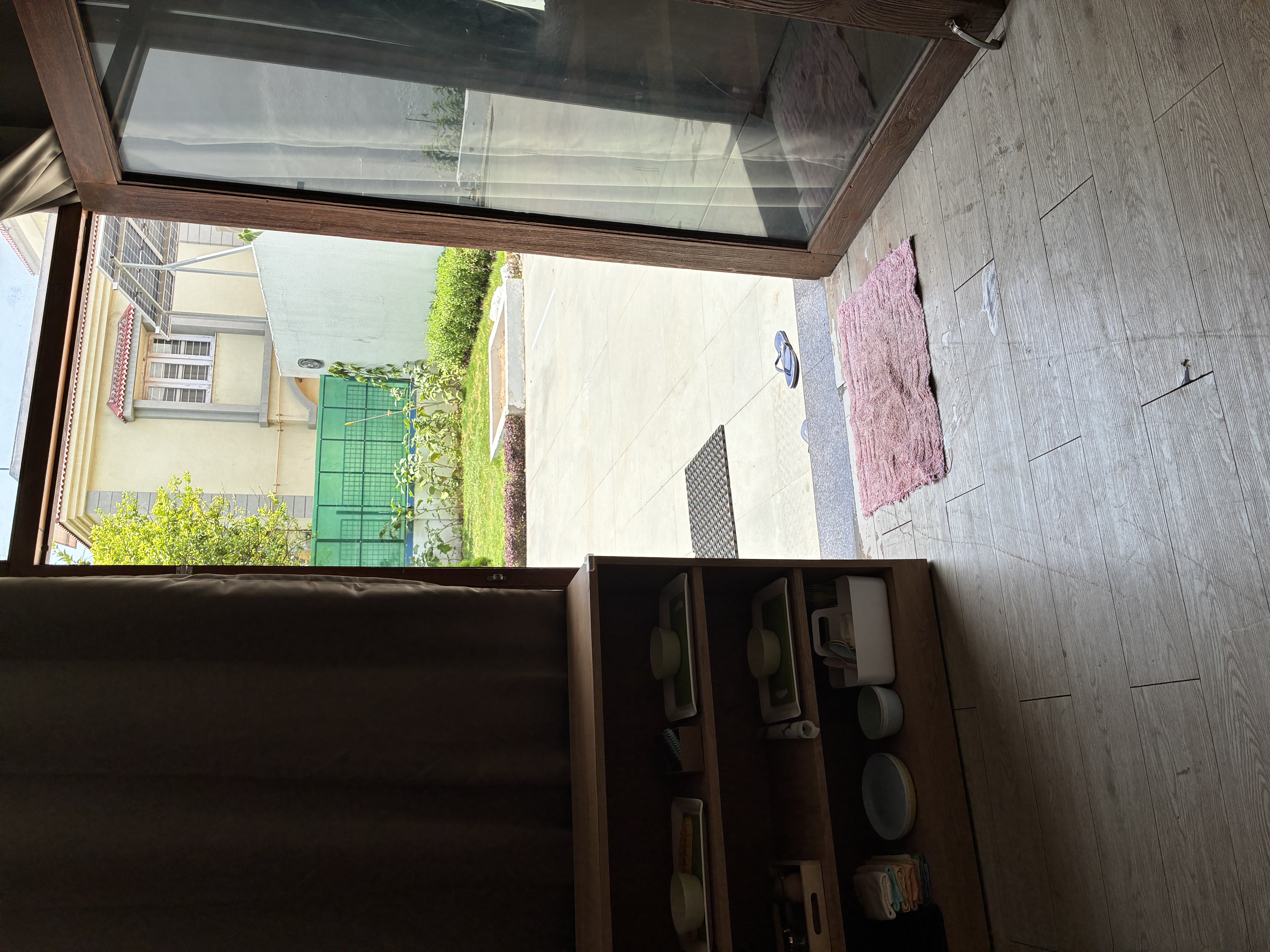 Indoor classroom glass sliding doors viewing open garden